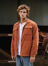 Jack Sacks orange jacket portrait